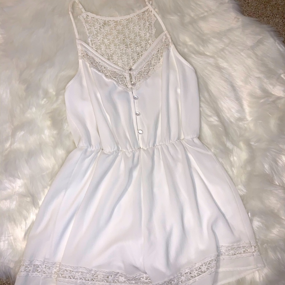 Lulu’s white lacy romper